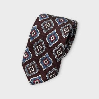 Cravatta Made in Como in pura seta bordeaux con motivi bianchi, rossi, azzurri 7cm x 148cm