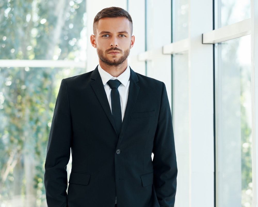 Elegant men's suit with black tie